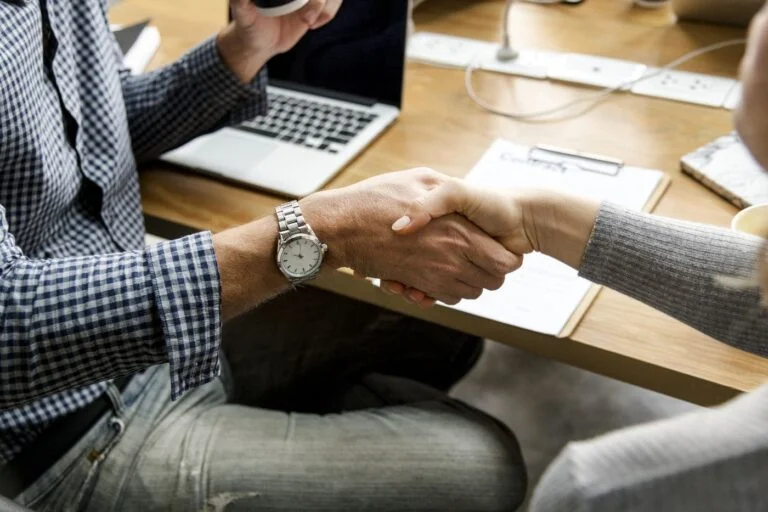 Business People Shaking Hands In Agreement