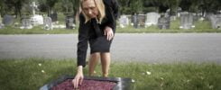 Elderly Woman Visiting Grave Loved One